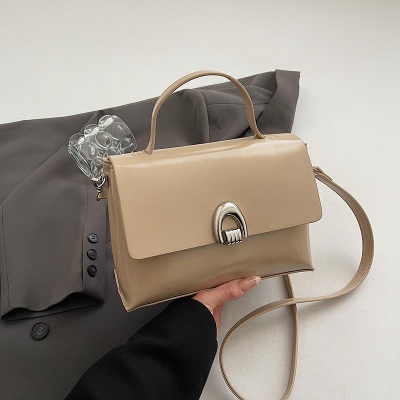 

Новая высококлассная сумка через плечо с чувством света, роскошная, простая, с контрастным цветом, темпераментная, портативная, трендовая женская сумка