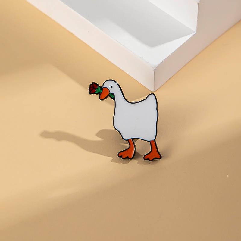 Urocza Broszka Kaczuszka z Kreskówki – Kreatywne Metalowe Akcesoria do Odznak