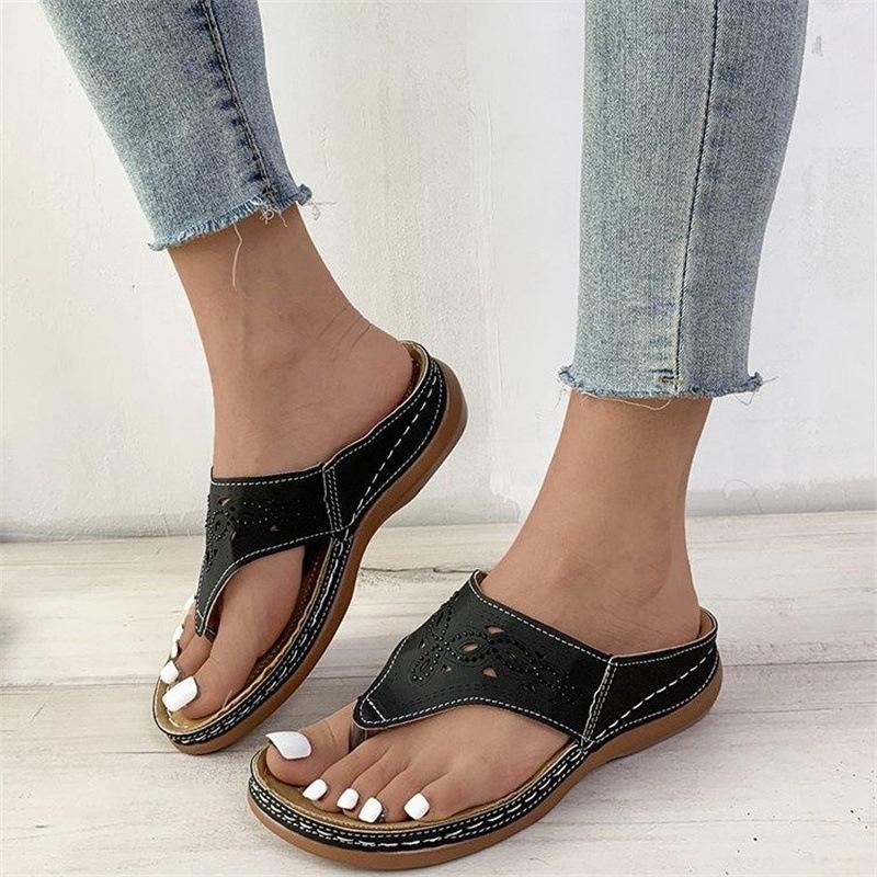 22 summer new European and American large size hollow rhinestone muffin bottom toe outside wearing beach cool slippers 35