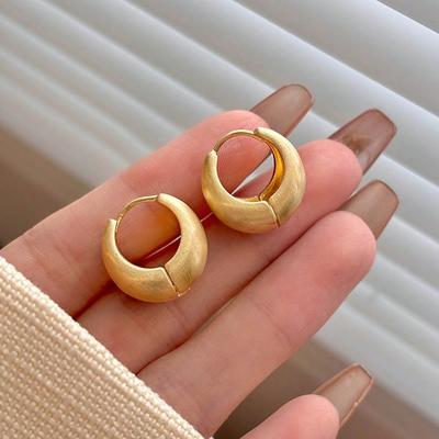 Orecchini circolari con texture metallica alla moda, orecchini eleganti e semplici