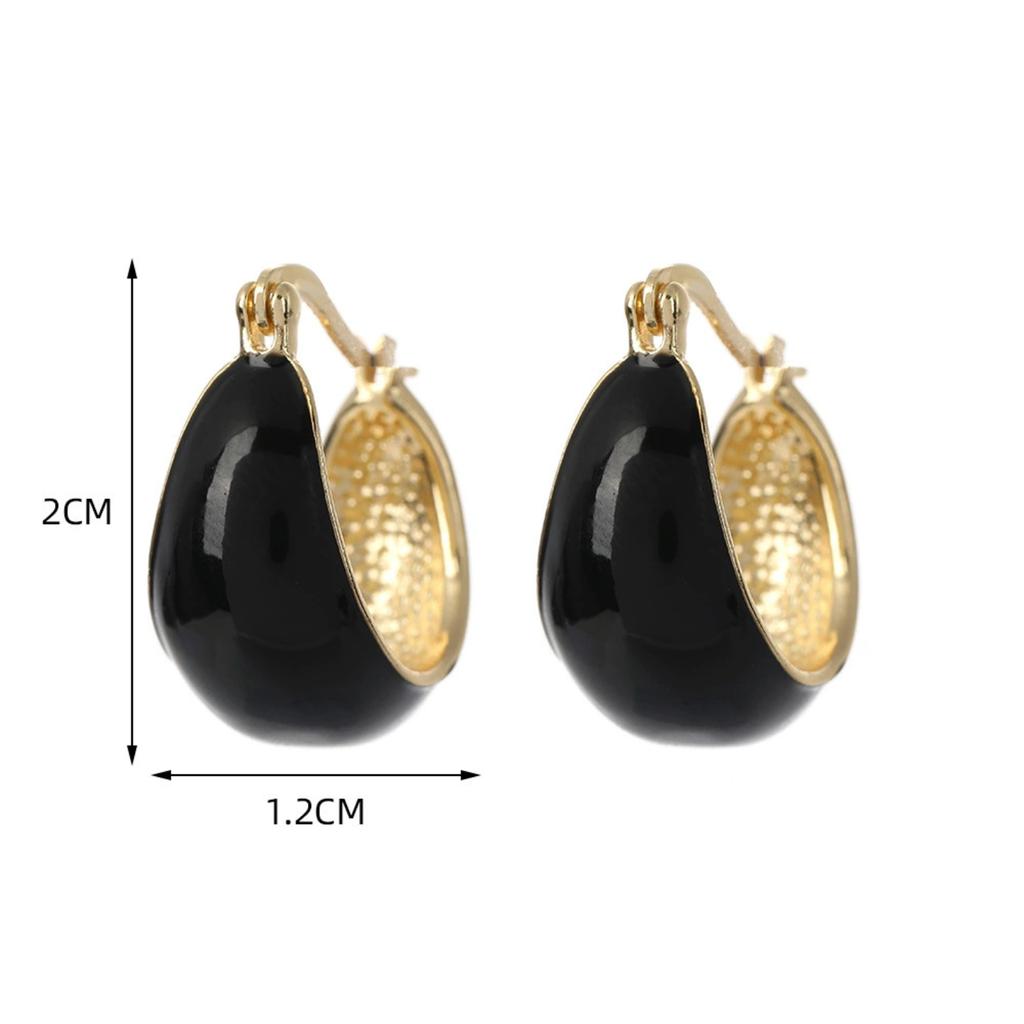 Kolczyki z kamieniem kociego oka w kształcie geometrycznego rombu, Popularny i stylowy wybór, który podkreśla rysy twarzy i wysmukla.