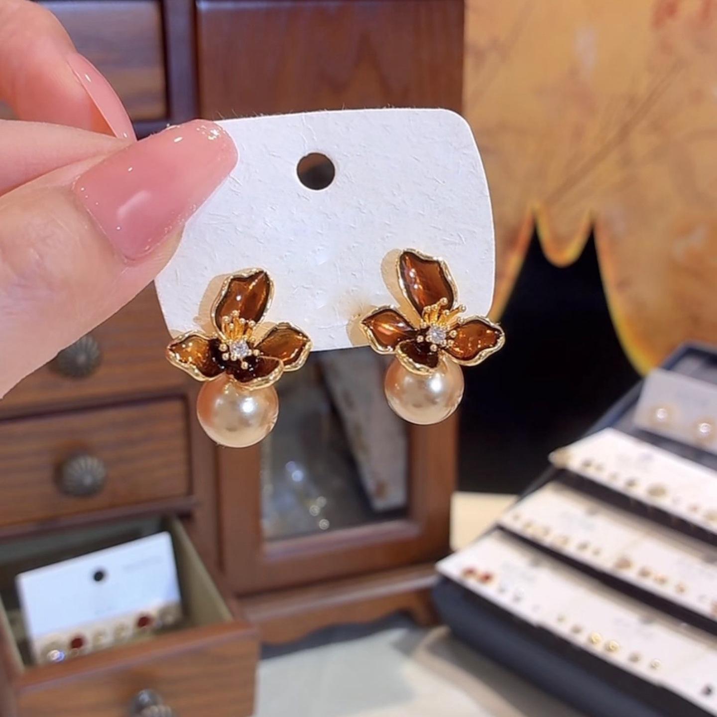 Gold-Plated Silver Zircon Flower Earrings: Chic, Retro, and Versatile.