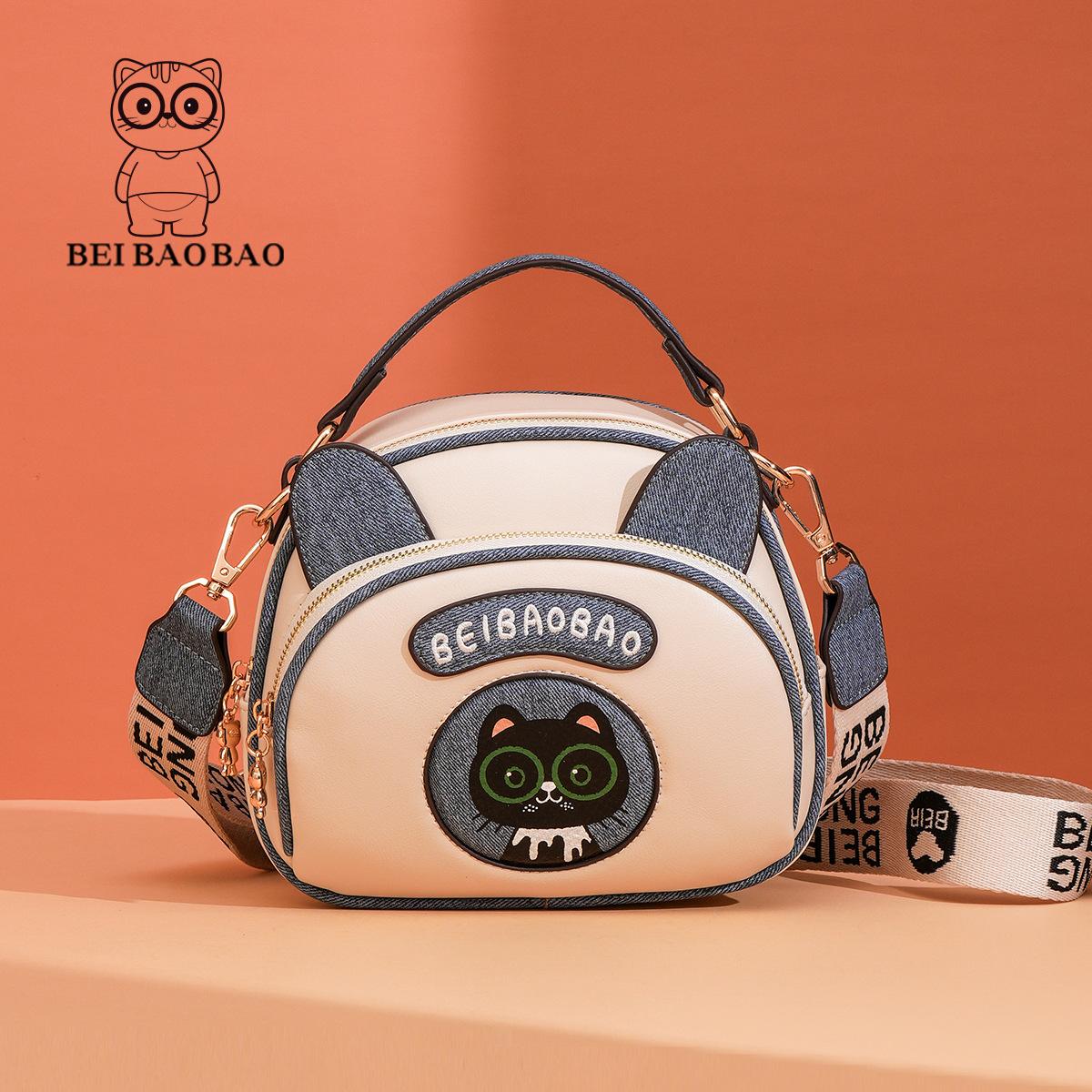 

Color Blocking Fashionable Small Round Bag, Niche Design, Cute and Versatile, Hand Withdrawal, Single Shoulder Crossbody Bag синій