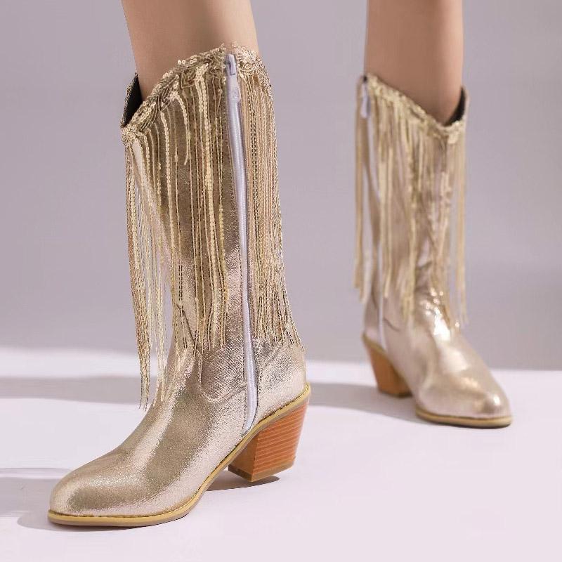 

Новые женские короткие сапоги на высоком каблуке осенью и зимой. Удобные и универсальные ботинки с кисточками на толстом каблуке.