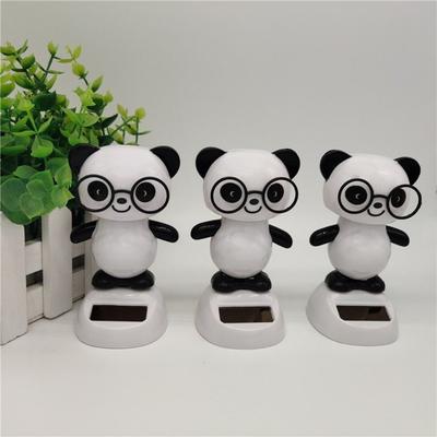 Panda zasilana energią słoneczną w okularach Automatyczna lalka kiwająca głową Ozdoba na deskę rozdzielczą samochodu Prezent Dekoracja samochodowa Wisiorek do wnętrza samochodu