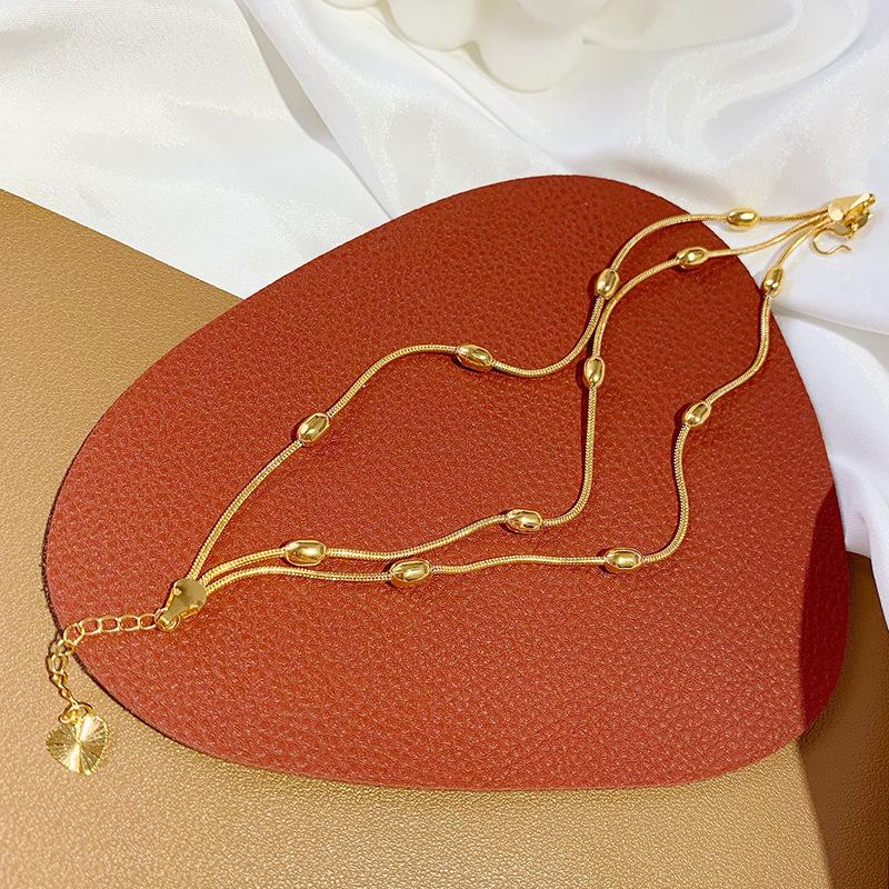 Gilt Brass Lotus Seed Pod Bracelet with Vietnamese Sand Gold Transfer Beads.