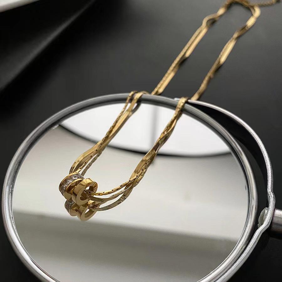 Elegant Colorfast 18K Rose Gold Necklace with Swan & Four-Leaf Clover Charm