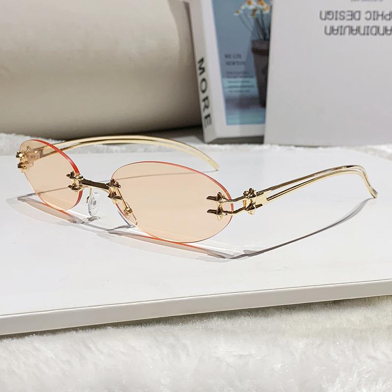 

cutting rimless small oval star sunglasses for women new fashion alloy Y2K sun glasses ladies hip hop gradient sun glasses uv400 as picture оранжевый