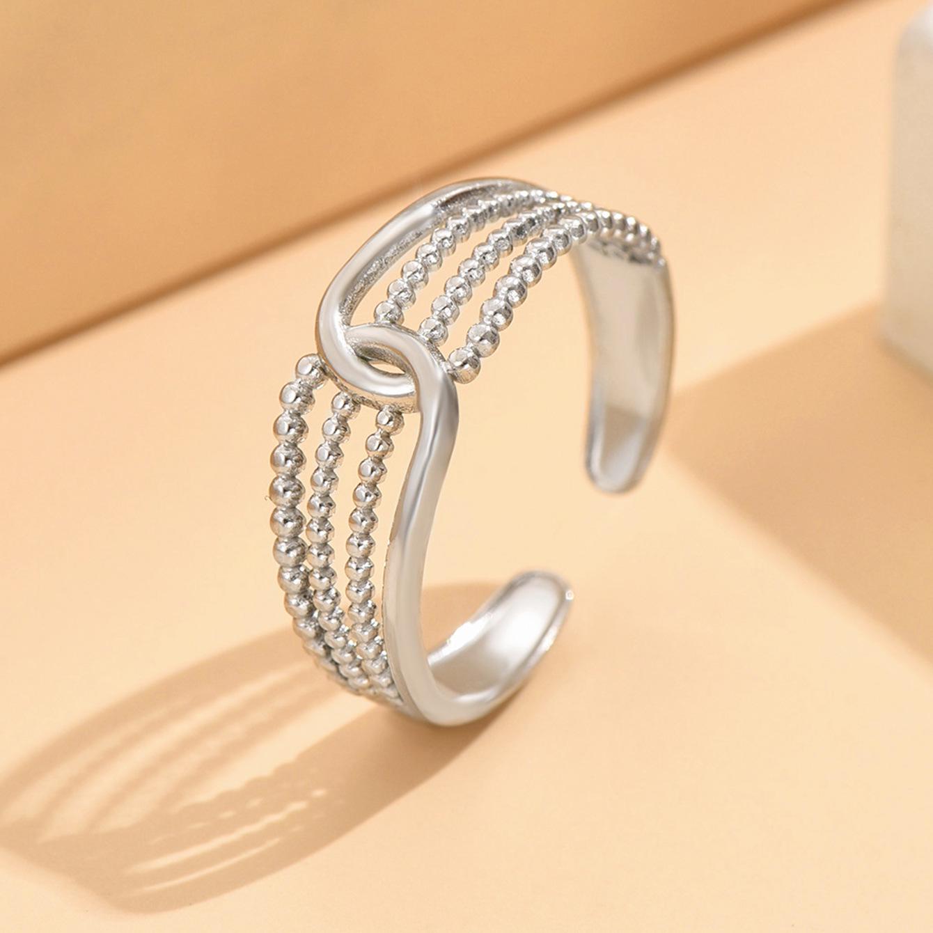 Elegant Intersecting Lines Stainless Steel Adjustable Ring