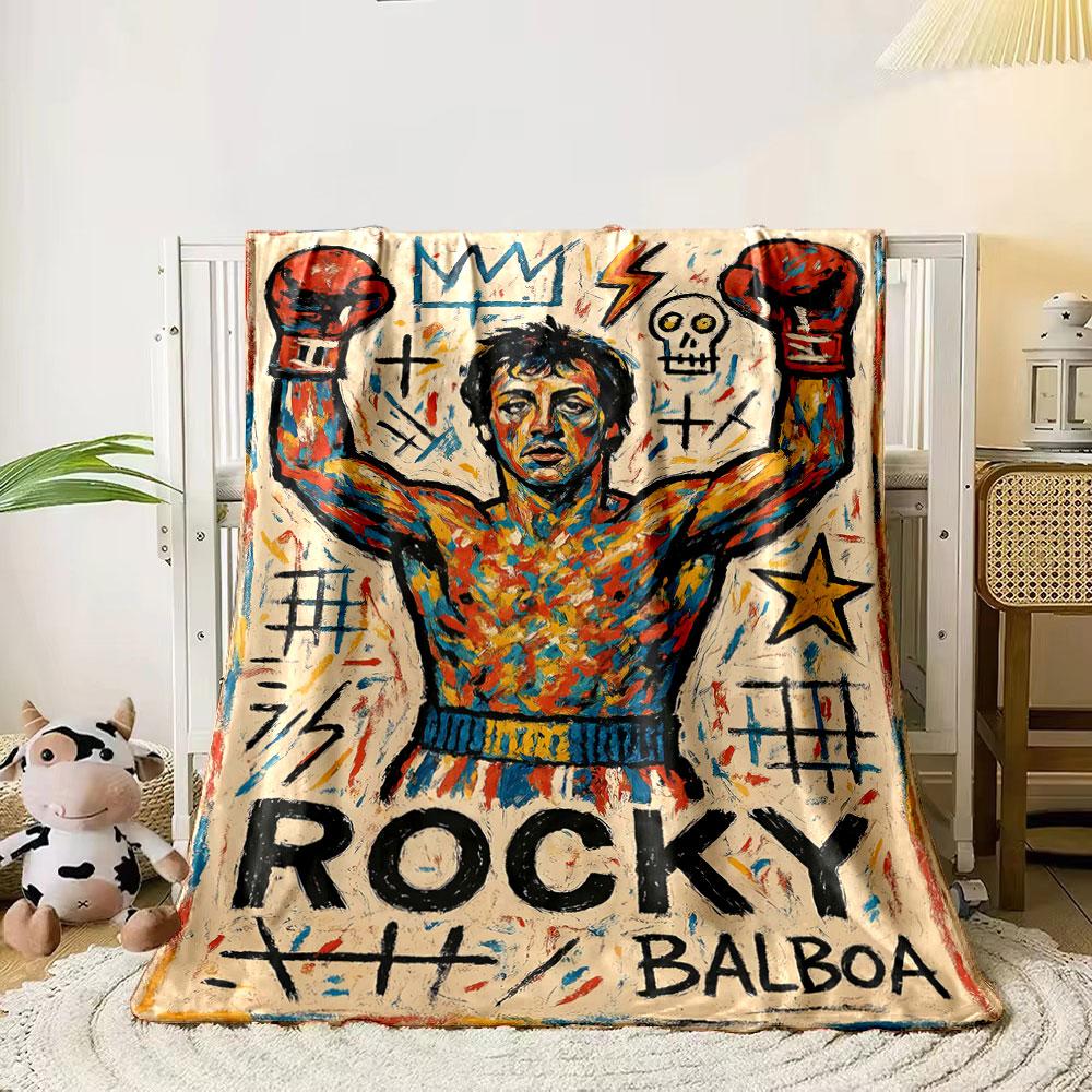 

A colorful boxer with raised arms surrounded by symbols and bold text. for all seasons blanket lunch break throw gift 80cm x 120cm