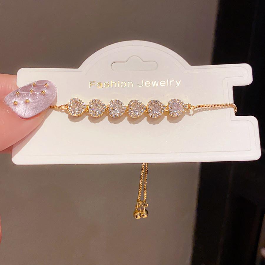

Gold Plated Adjustable Heart Shape Bracelet With Cubic Zirconia For Elegant Gift For Women золотой