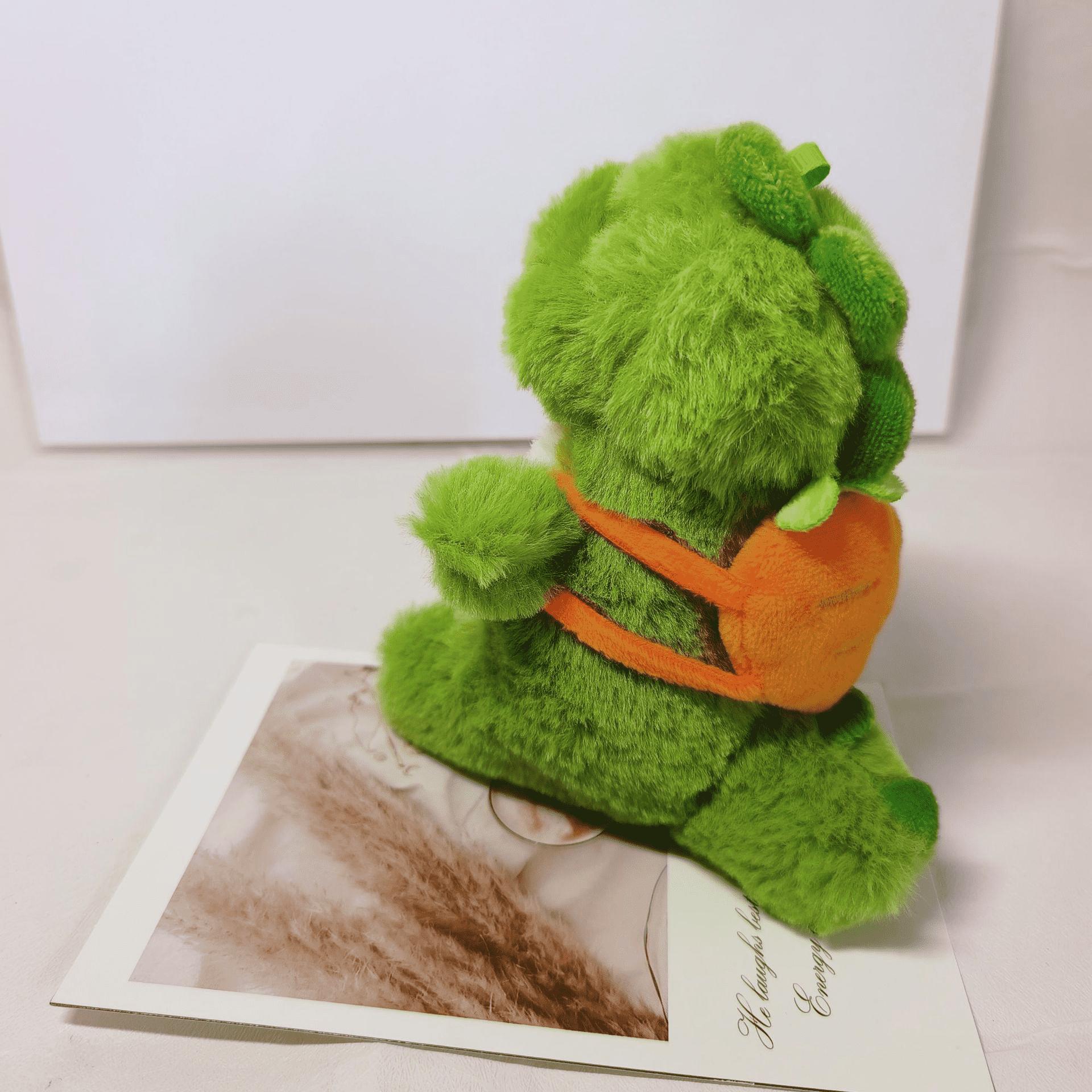 

13cm Adorable Skipping School Dinosaur Plush Toys A Strawberry, Avocado and Carrot Dinosaur Pendant On the Back Toys for Kids 13cm