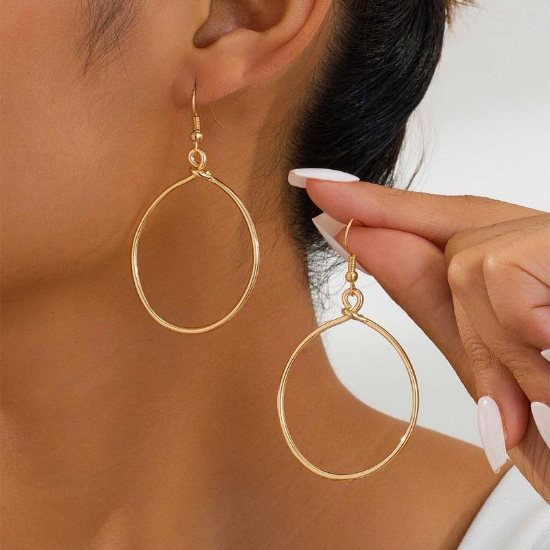 A set of four pairs of golden yellow glossy earrings, flower love, geometric style, simple, elegant and fashionable