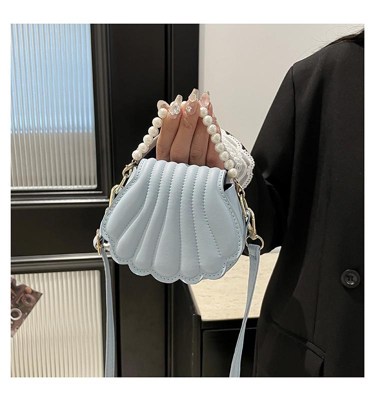 

2026 Spring/Summer Shell Pearl Crossbody Handbag - Versatile & Trendy Design for Women 13*5.5*11 cm синий