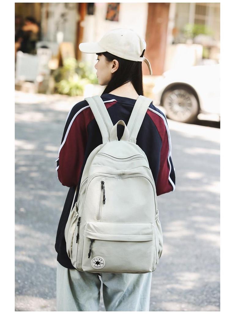 Niche Lightweight Nylon Backpack: Large-Capacity, Casual, Unisex Shoulder Bag for Commuters and Students