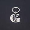 Stainless Steel Alphabet Flower Cutout Keychain Pendant