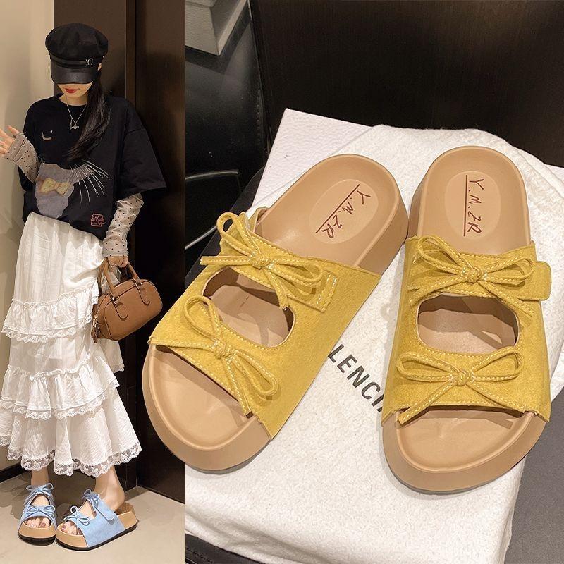 Thick-bottomed bow-tied cool slippers for women's summer wear, new versatile, comfortable and cute soft-bottomed one-word drag