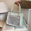 Japanese two-dimensional yuan handbag woman 2025 new girl soft girl shoulder crossbody pain bag portable commuter bag woman