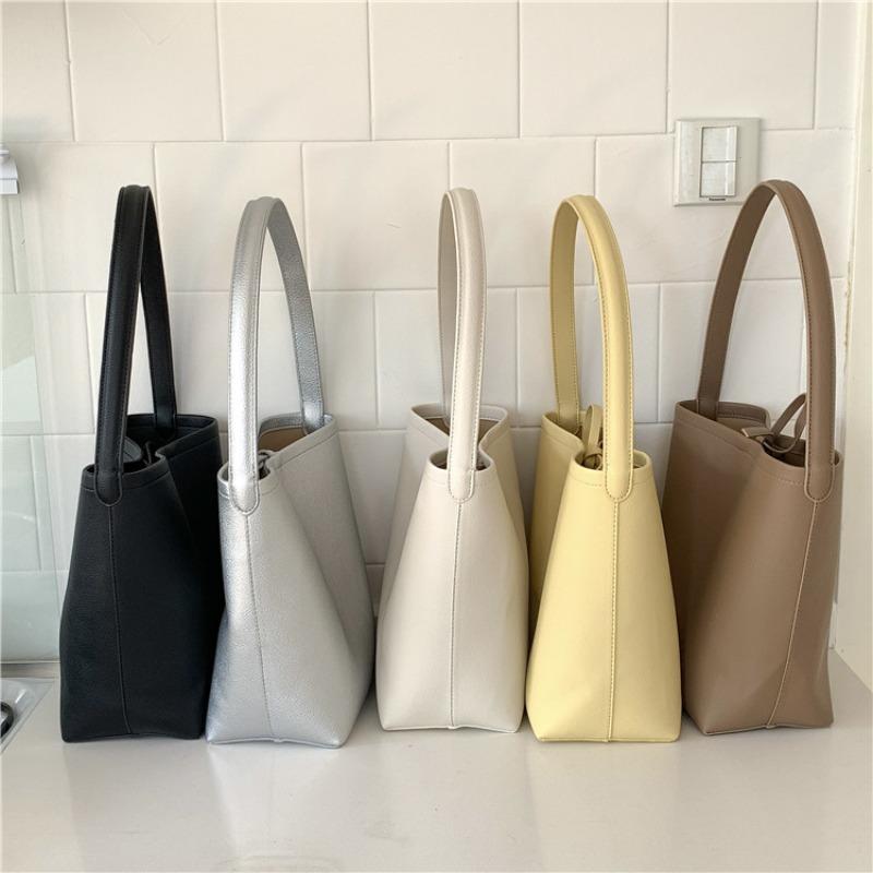 Bucket bag logo shoulder bag large capacity high sense solid color simple leather cylinder mother and child bag