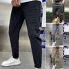 Calças Masculinas Cintura Elástica Múltiplos Bolsos Alta Elasticidade Bordado de Letras Comprimento no Tornozelo Uso Diário Cor Sólida Slim Fit Seda de Gelo Calças Lápis Masculinas Homem