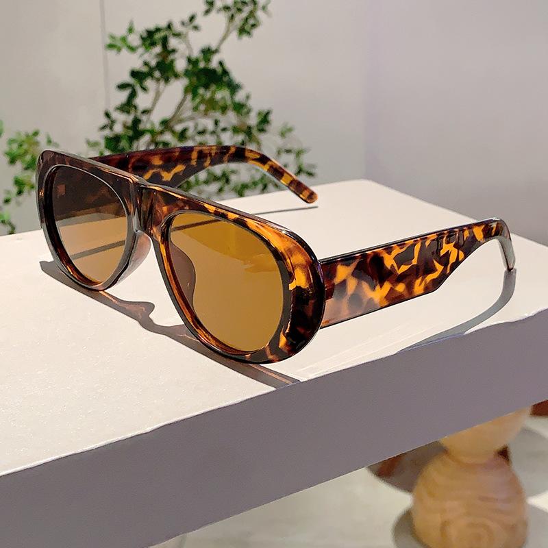Fashion New Retro Oval Large Frame Sunglasses Wide Leg Jelly Color Personalized Design UV Resistant Sunglasses Female