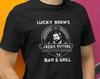 Jackie Daytona - Lucky Brew's Bar and Grill Unisex Tshirt - What We Do In the Shadows