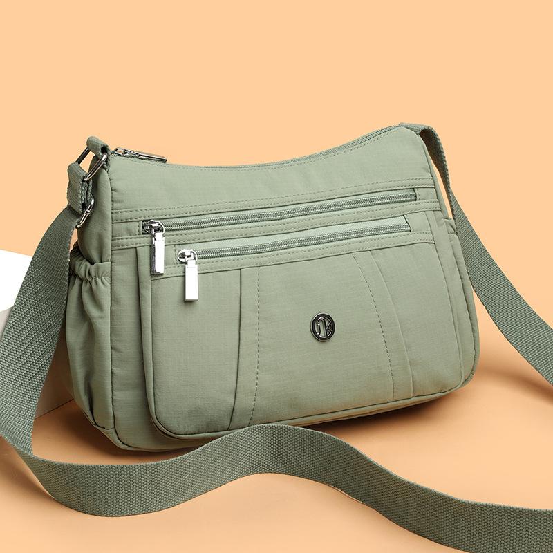Single-shoulder Bag - Stylish and Simple Backpack with Multiple Functions for Travel, Featuring Multiple Compartments and A Small Square Shape.