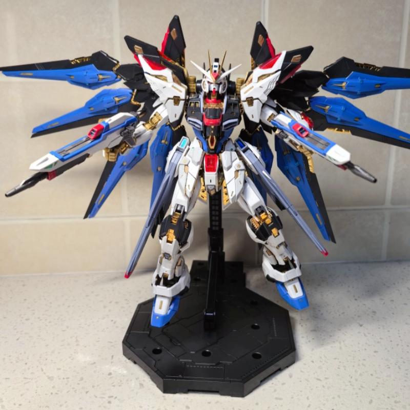 1/100 MGEX Scale Strike Freedom Assembly Mecha Model Kit with Wings of Light Action Figure Collectible Toy for Fans Adult Gift