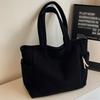 A Casual Corduroy Handbag with Zip Closure, Lightweight and Large Capacity, Fixed Shoulder Strap and Polyester Lining, Solid Everyday Commuter Handbag