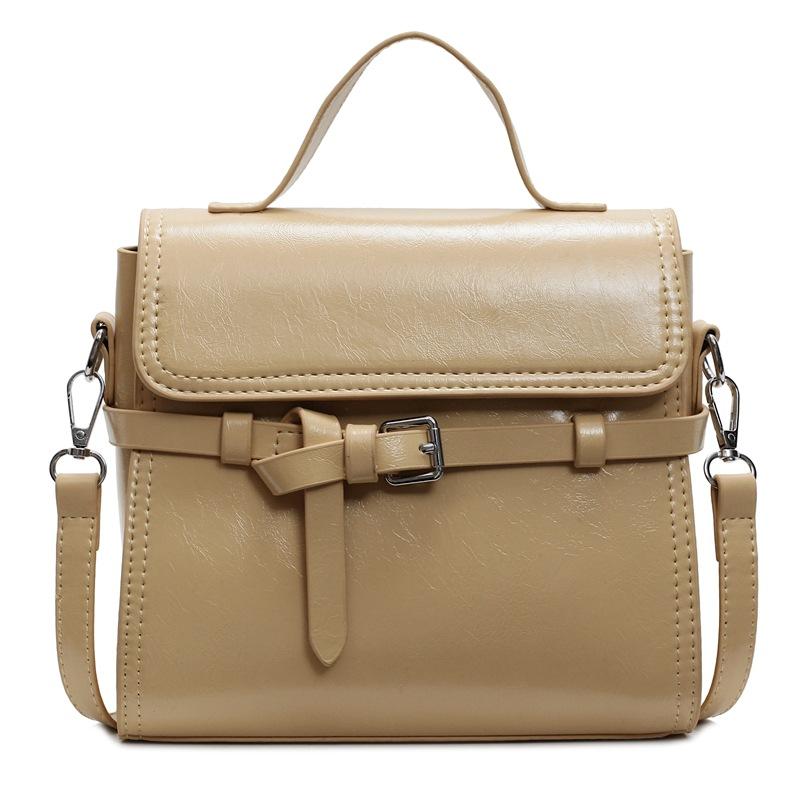 Trend niche high-end sense solid color versatile portable small square bag women's commuting simple oil wax leather messenger bag