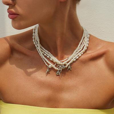 Chaîne de clavicule simple en imitation perle en forme d'étoile de mer, à la mode et polyvalente, collier à nœud superposé pour femmes