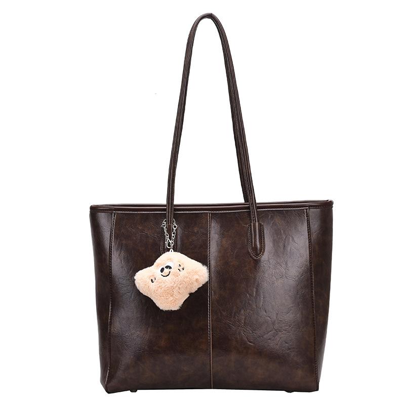 Retro large-capacity bag women's 2025 new Korean versatile simple tote bag commuting to work shoulder armpit bag