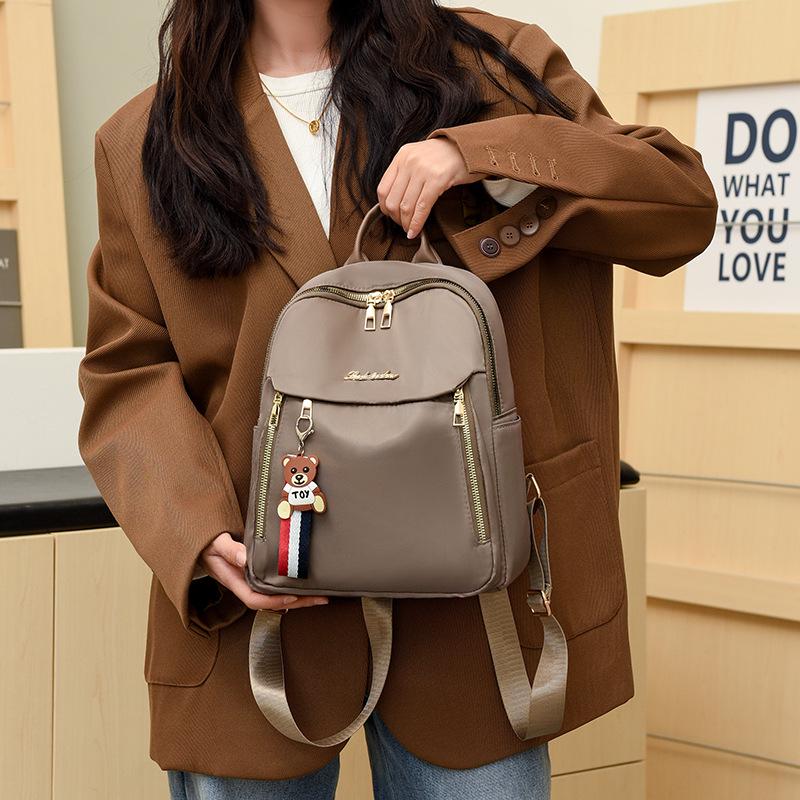 2025 Women's Oxford Cloth Lightweight Small Fashion Travel Backpack & Handbag