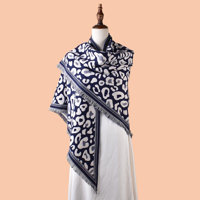 Autumn and winter new classic leopard print tassel imitation cashmere triangle scarf warm scarf shawl fashion spot wholesale