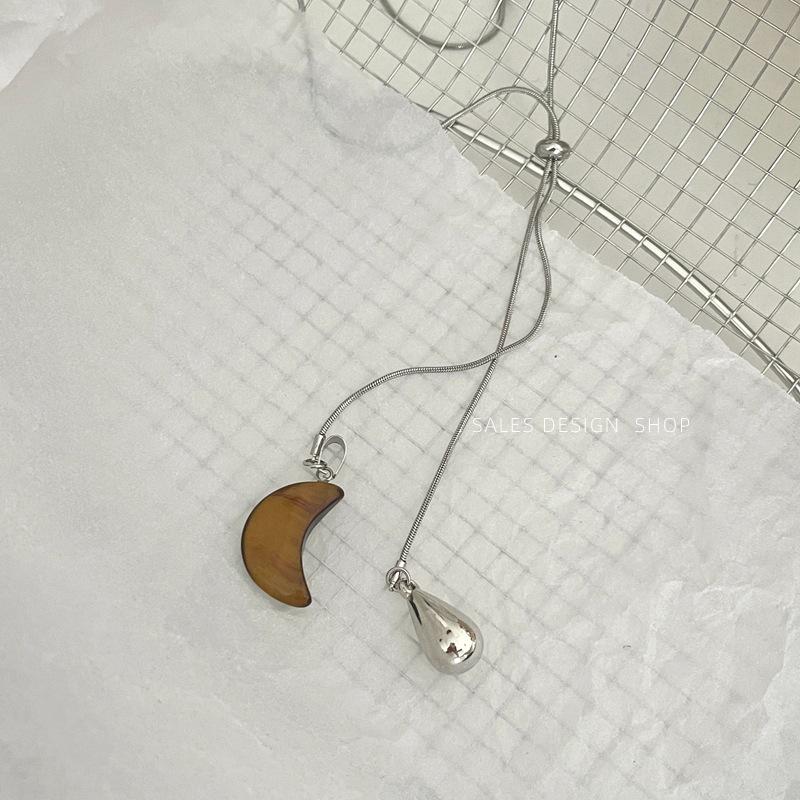 

Korean Luxury Tiger Eye Star Moon Sweater Chain - Trendy, Versatile Niche Design