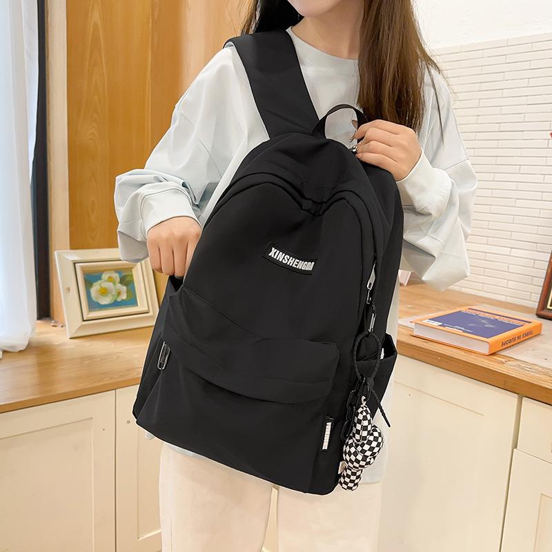 Elementary school bag, female junior high school student solid color backpack, high school student large capacity casual backpack fashion