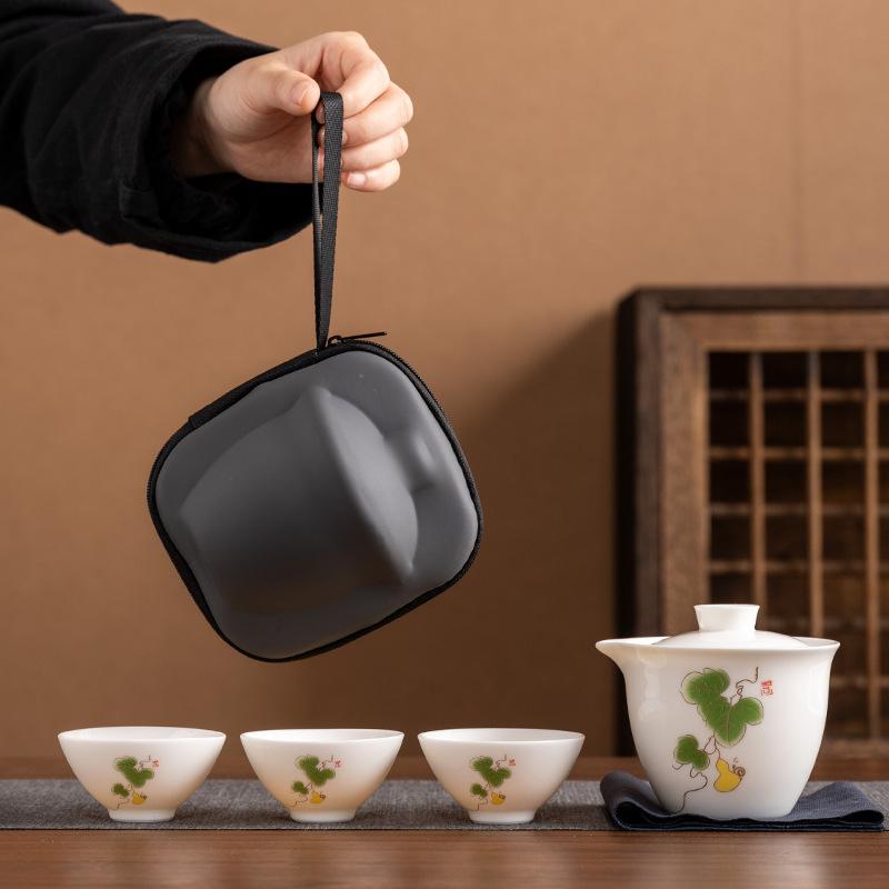 Suet jade porcelain high-end travel tea set, a pot of three cups, portable set, light luxury business commemorative holiday gifts