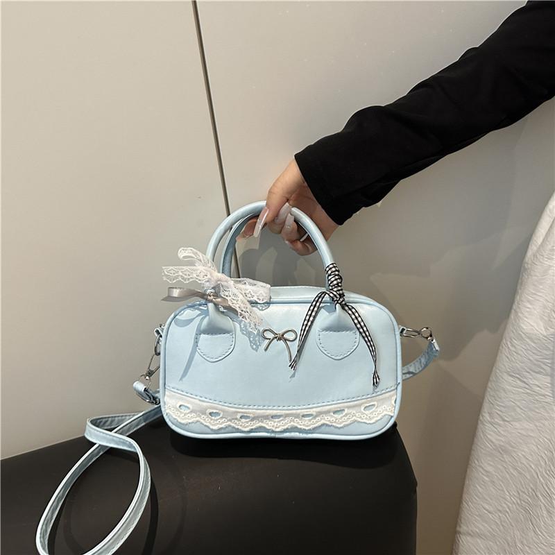 Trendy personality popular versatile shoulder bag women's foreign leisure high sense solid color ribbon temperament messenger bag