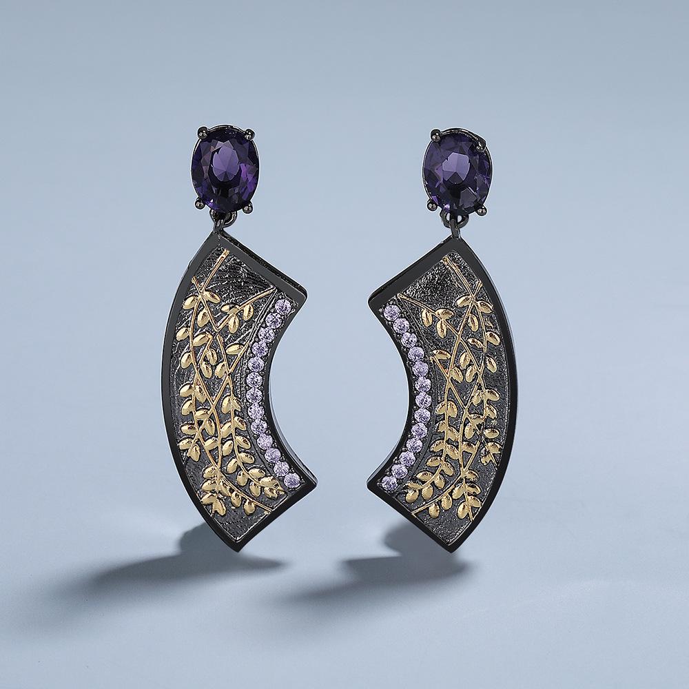 Винтажные двуцветные серьги-веера с синими цирконами, черные с золотом.