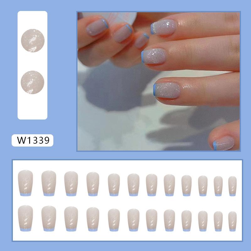 

Simple flash blue French short ballet fresh European and American fake nails ins wind wearing nail mixed batch nails
