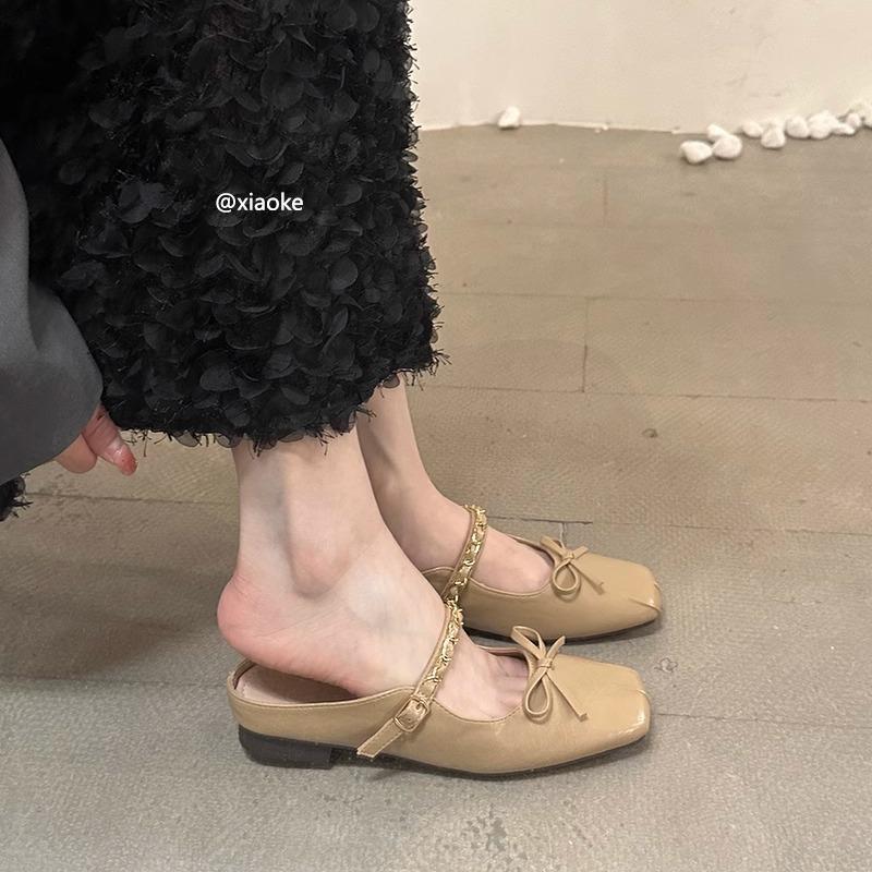 XINZHOU Xiaoxiangfeng główka torby półkapcie damskie odzież wierzchnia 2025 wiosna i lato nowe francuski temperament kapcie Muller