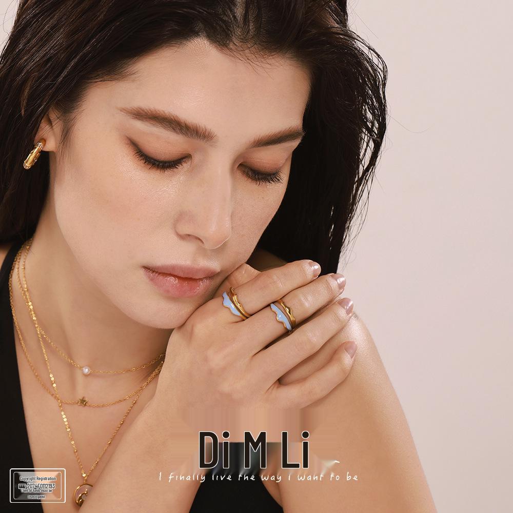 

Mili Fama Double Layer Wave Ring: Temperament Creative Open Stainless Steel with Real Gold Plating, Non-Fading Women s Jewelry. Size 7