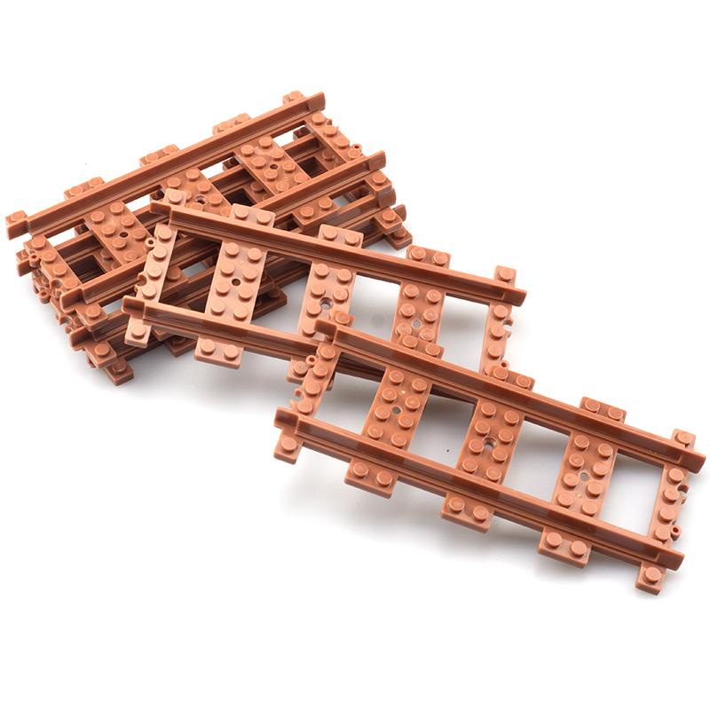 Trenler Raylı Yol Aksesuarları Şehir Virajlı Düz Makaslı Raylı Yol Geçitleri kahverengi Yapı Taşı Oyuncakları çocuklar için hediye