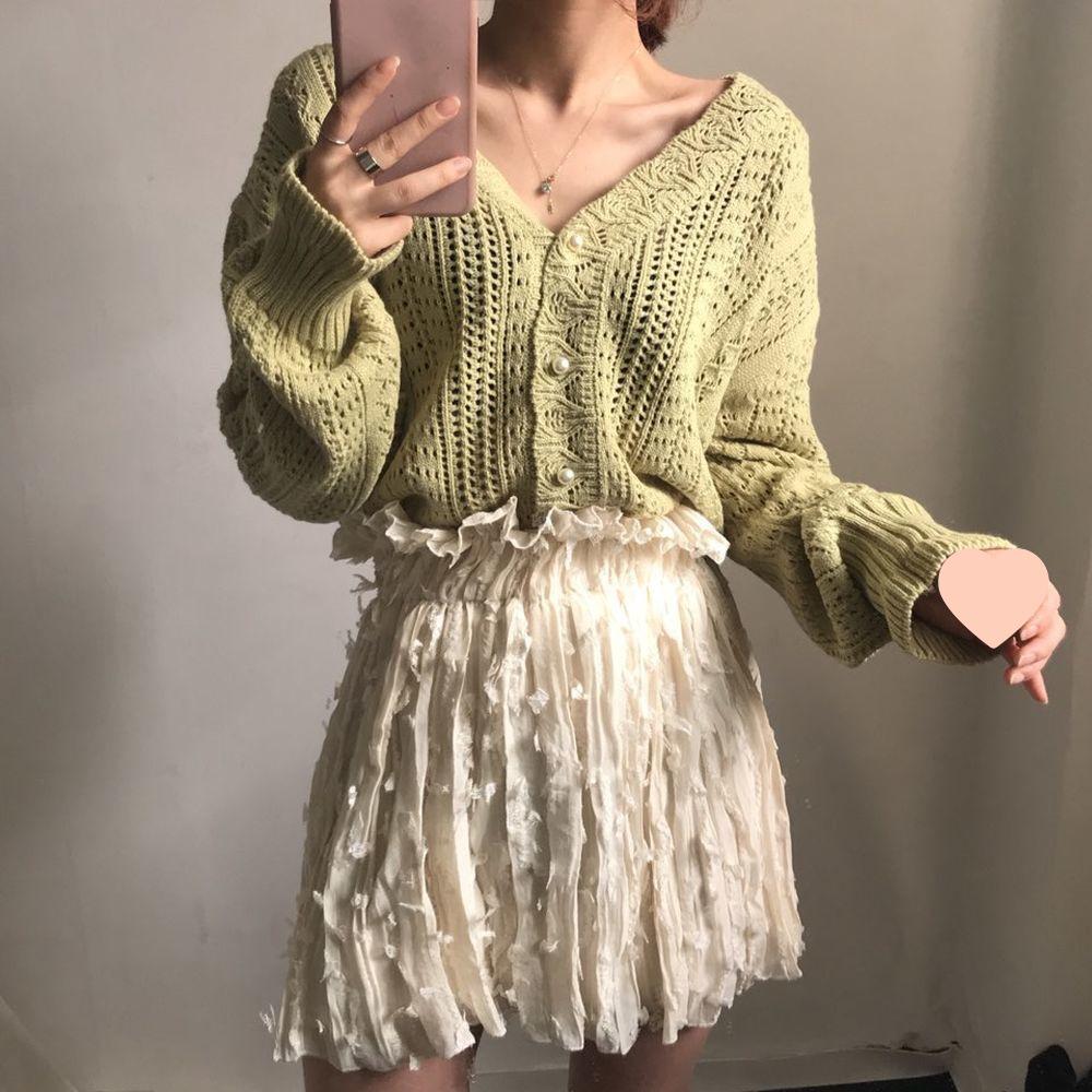 

Жіночий вільний білий в язаний кардиган з ажурним візерунком на весну 2025 3XL зелений