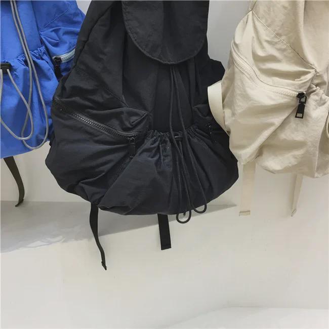 Introducing the New Simple Nylon Drawstring Backpack: a Spacious, Versatile Bag Perfect for Students, Leisure Trips, and Sports Activities.