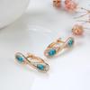 Kinel Blue Zircon Symmetric Rose Gold Color Earrings