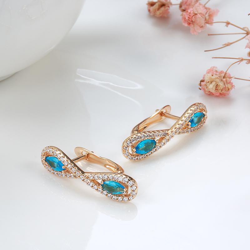 Kinel Blue Zircon Symmetric Rose Gold Color Earrings