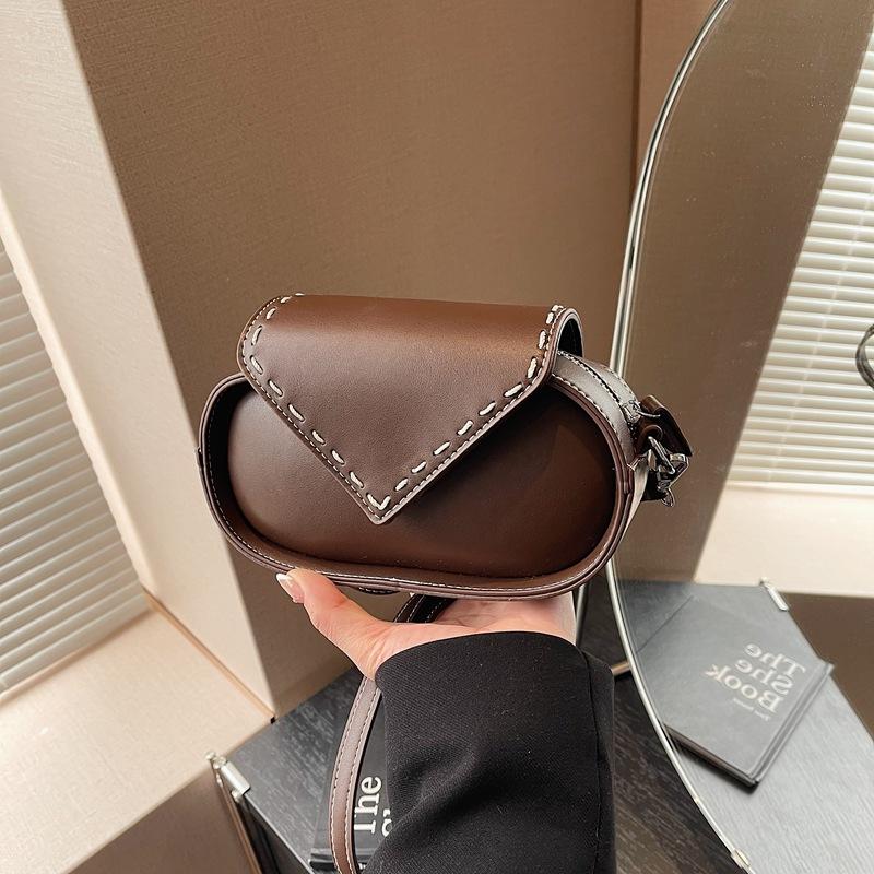 

Ankela red envelope bag female niche design new versatile shoulder messenger bag small round bag