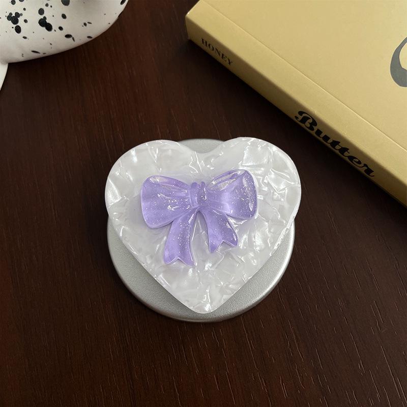 

Jelly Bow New Model MagSafe-Compatible Magnetic Bracket: Strong Adsorption, Retractable Airbag Desktop Stand