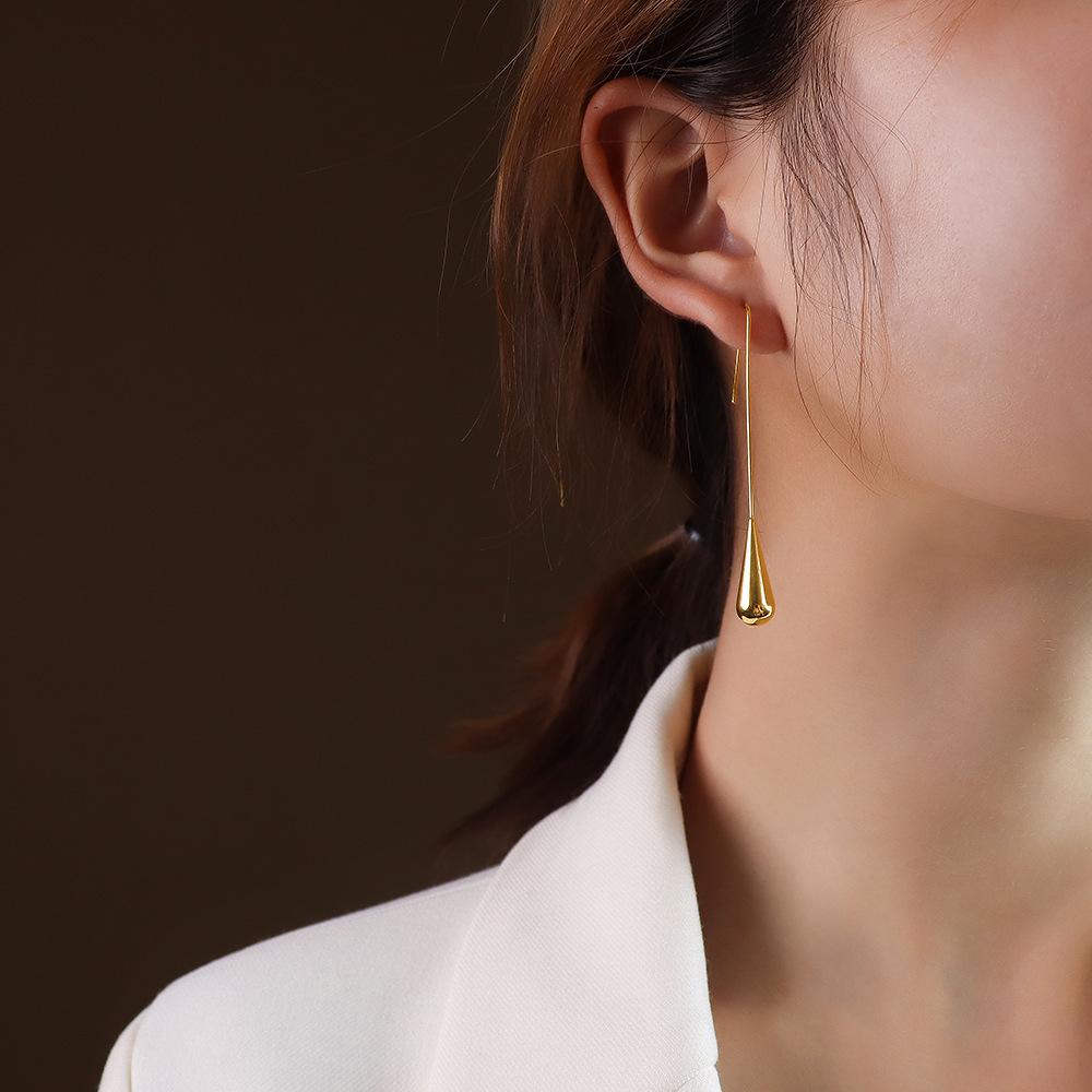 Boucles d'oreilles pendantes minimalistes européennes et américaines polyvalentes en forme de goutte d'eau pour femmes